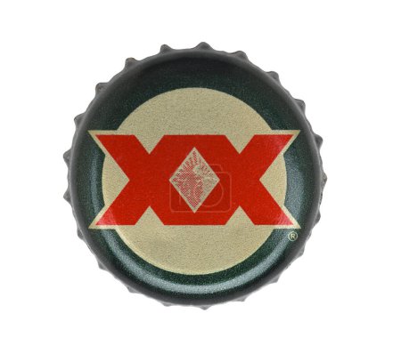 Photo for IRVINE, CALIFORNIA - 4 JUNE 2020: Closeup of a Dos Equis beer bottle cap on white. - Royalty Free Image