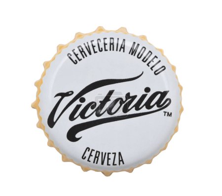 Photo for IRVINE, CALIFORNIA - 4 JUNE 2020: Closeup of a Victoria beer bottle cap on white. - Royalty Free Image