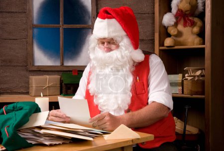 Photo for Santa Claus in Workshop with Letters - Royalty Free Image