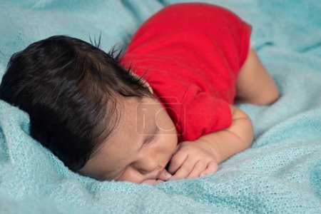 Photo for Sleeping baby on bed - Royalty Free Image