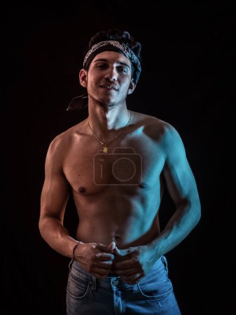 Photo for "Handsome muscular shirtless young man standing confident" - Royalty Free Image