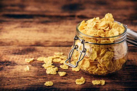 Photo for Jar full of corn flakes, close-up view - Royalty Free Image