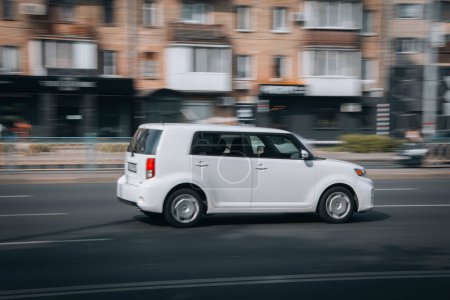 Photo for "Ukraine, Kyiv - 16 July 2021: White Scion xB car moving on the street. Editorial" - Royalty Free Image