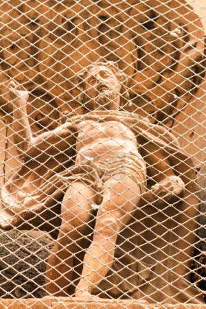 Téléchargez les photos : "Statue de Jésus-Christ sur la façade de l'église Santa Maria à Elche" - en image libre de droit