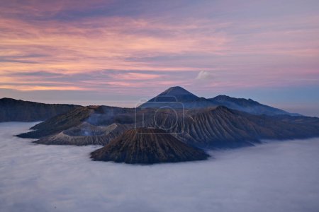 Photo for "Bromo mountain with fog layer at sunrise, East Java, Indonesia" - Royalty Free Image