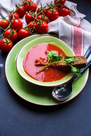 Photo for Close-up shot of fresh organic tomato soup on tabletop for background - Royalty Free Image