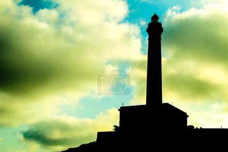 Photo for Beautiful Cabo de Palos lighthouse silhouette on a sunny day of summer - Royalty Free Image
