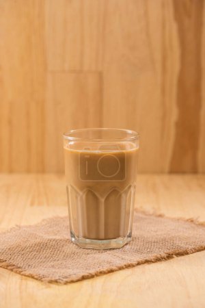 Photo for "Coffee with milk on a wooden table." - Royalty Free Image