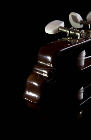 Photo for Closeup of guitar on dark background - Royalty Free Image
