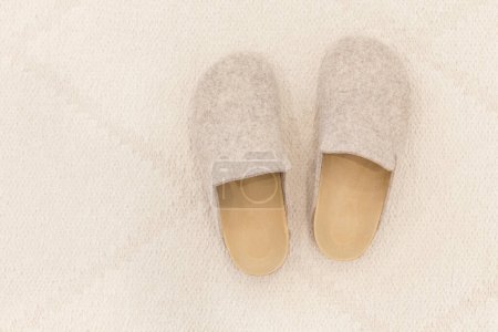 Photo for Cozy felt slippers with cork sole - Royalty Free Image