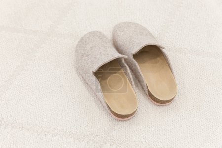 Photo for "Woman house slipper on floor carpete slippers" - Royalty Free Image