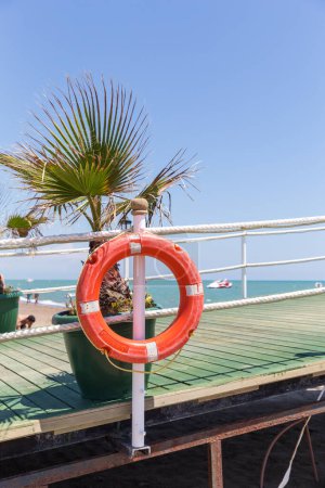 Photo for Life buoy on the sea beach - Royalty Free Image