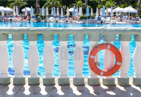 Photo for Swimming pool with blue water and red circle - Royalty Free Image
