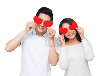 Photo for Boyfriend and girlfriend kissing with happy face expression looking each other in eyes. Couple of asian lovers at the beginning of love story having fun together. - Royalty Free Image