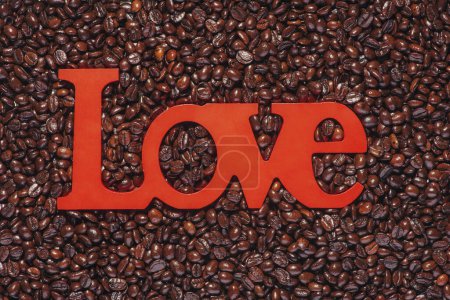 Photo for "Coffee beans. Roasted coffee beans with shape Love on background." - Royalty Free Image
