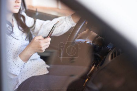 Photo for Texting and driving concept - Royalty Free Image