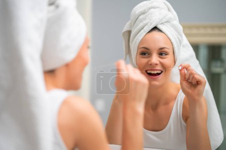 Photo for Beautiful young woman doing morning routine at home - Royalty Free Image