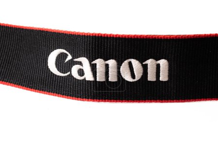 Téléchargez les photos : Canon lettrage bracelet appareil photo sur le fond blanc - en image libre de droit