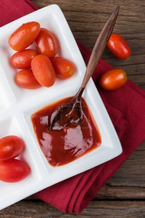 Photo for Tomatoes and ketchup, close up - Royalty Free Image