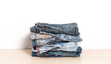 Photo for Stack of Jeans on a white background - Royalty Free Image