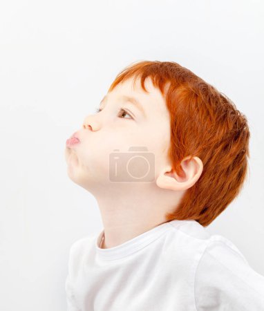 Photo for Boy puffed cheeks , close up - Royalty Free Image