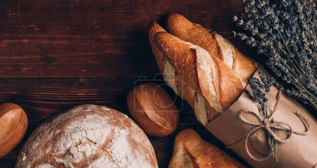 Photo for "freshly baked baguettes for breakfast in paris. private bakery concept. gluten free bread" - Royalty Free Image