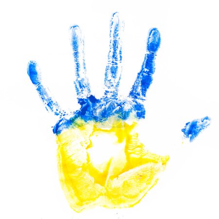 Photo for Child's hand imprint in Ukraine colors - Royalty Free Image