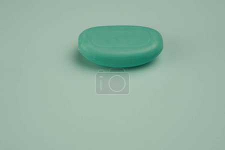 Photo for Soap hygiene body care bathroom supplies green background - Royalty Free Image