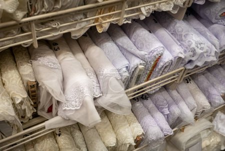 Photo for "Rolls of fabric material in a textile shop" - Royalty Free Image
