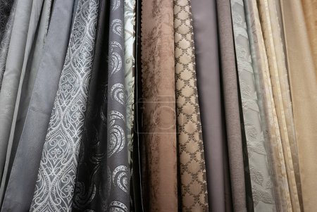 Photo for "Curtains of different colors and styles in the shop" - Royalty Free Image