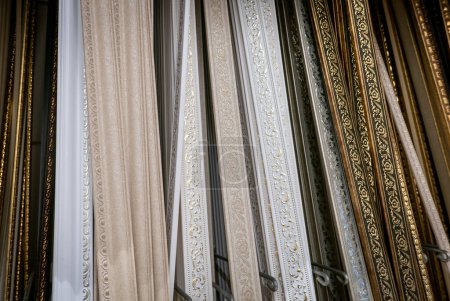 Photo for "Decorative skirting boards in a construction shop" - Royalty Free Image