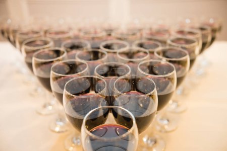Photo for "Glasses with alcohol and different drinks on the table" - Royalty Free Image