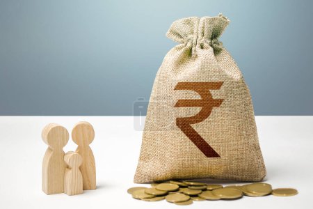 Photo for Indian rupee money bag with money and family figurines. Financial support for social institutions. Providing assistance to citizens. Investments in human capital, culture and social projects. - Royalty Free Image
