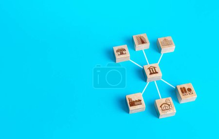 Photo for "Block figurine bank is connected with institutions establishment and civil organizations. The functioning of the financial banking system. Lending and operating money transactions. Regulation economy" - Royalty Free Image