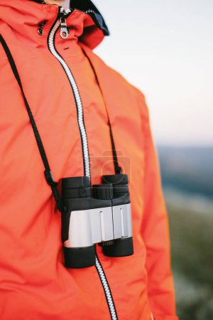 Photo for Hiker with binoculars, closeup - Royalty Free Image
