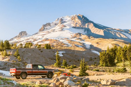 Photo for Top of Mt. Hood, Oregon, and a red pickup truck - Royalty Free Image