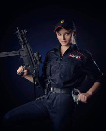 Photo for Girl in the police uniform with a gun is policeman with gun. English translation of Police - Royalty Free Image