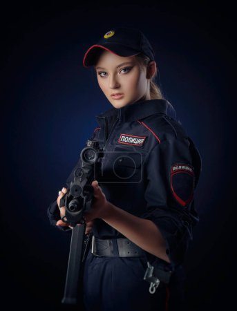 Photo for Police girl with gun - Royalty Free Image