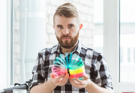 Photo for Man with colorful toy - Royalty Free Image
