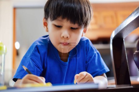 Photo for Cute little Asian boy drawing - Royalty Free Image