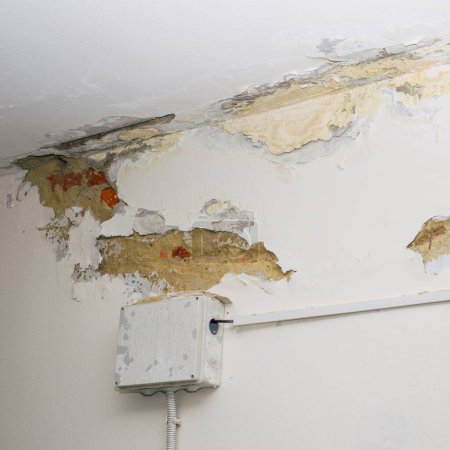 Photo for Damage ceiling from water pipelines leakage. Housing problem concept - Royalty Free Image