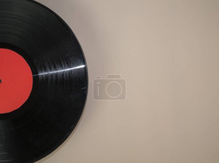 Photo for Vinyl record on beige background - Royalty Free Image