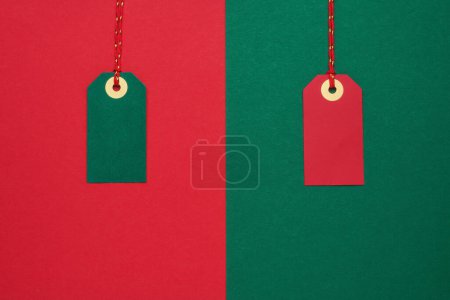 Photo for Sale tags on red and green background. Top view - Royalty Free Image