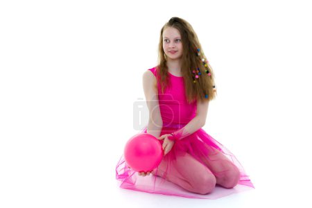Foto de "Hermosa chica gimnasta en su pelo que se dispersa con multi
" - Imagen libre de derechos