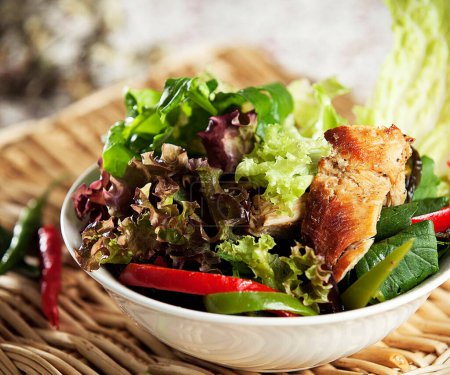 Photo for Close-up shot of delicious salad with chicken for background - Royalty Free Image