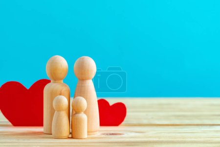 Photo for "Wooden little figures of people. Family concept" - Royalty Free Image