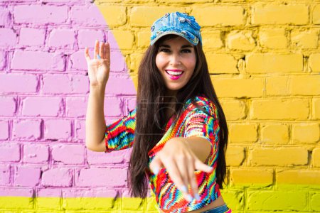 Photo for Street dance, freestyle and jazz funk concept - Beautiful girl dancing hip-hop over brick wall - Royalty Free Image