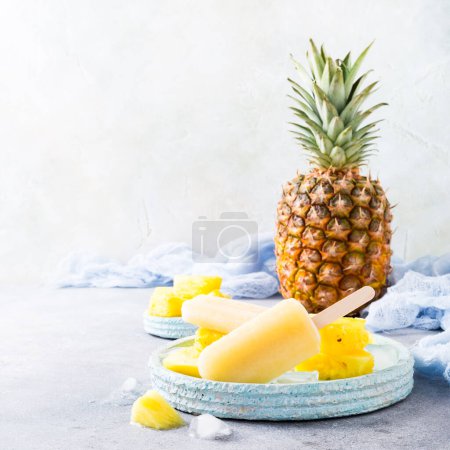 Photo for Homemade pineapple popsicles close-up view - Royalty Free Image