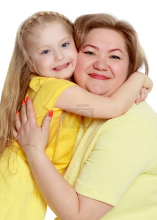 Photo for "A happy mother hugs her beloved daughter." - Royalty Free Image