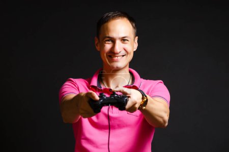 Photo for Man playing with a video game controller - Royalty Free Image